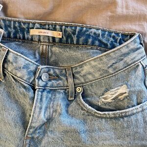 Levi’s Low Loose Light Wash Distressed Denim Jeans